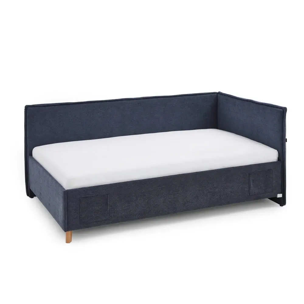 Pat pentru copii albastru închis pe colț tapițat cu spațiu de depozitare cu somieră 140x200 cm Fun – Meise Möbel