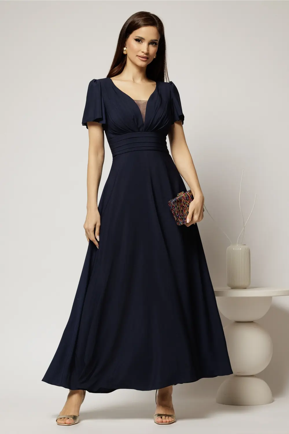 Rochie lunga bleumarin de ocazie cu decolteu adanc si maneci scurte evazate